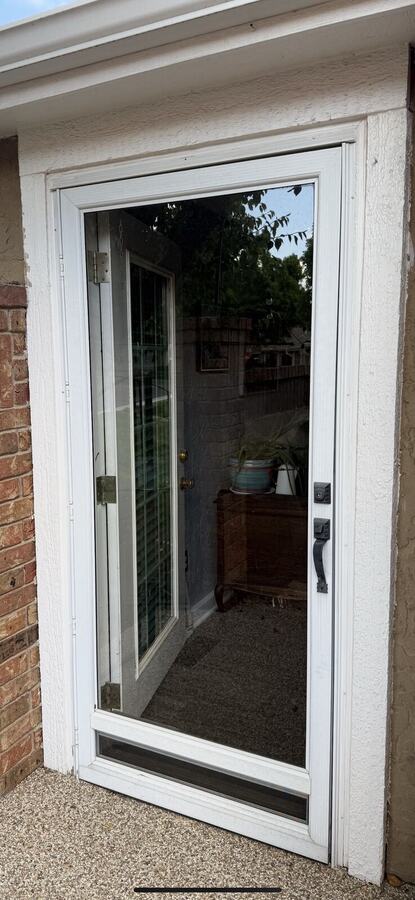 Storm door before replacement